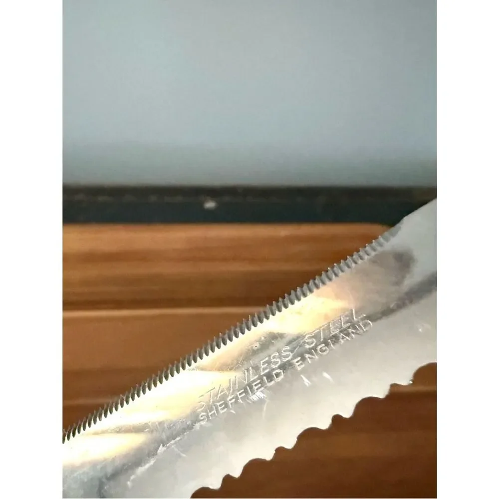 vintage faux bone handle bread knife sheffield england